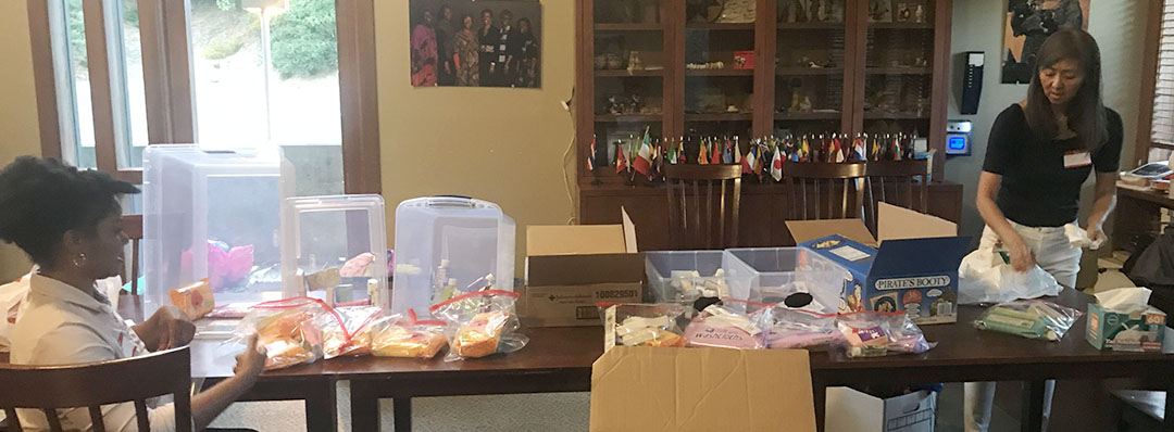 Volunteers with Homeless Kit Making